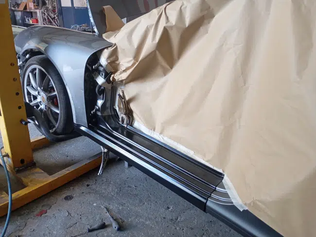 Porsche 997 Carrera 4S, réparation aile et bas de caisse