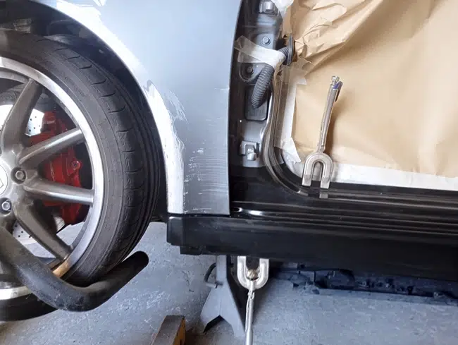 Porsche 997 Carrera 4S, préparation latérale en atelier
